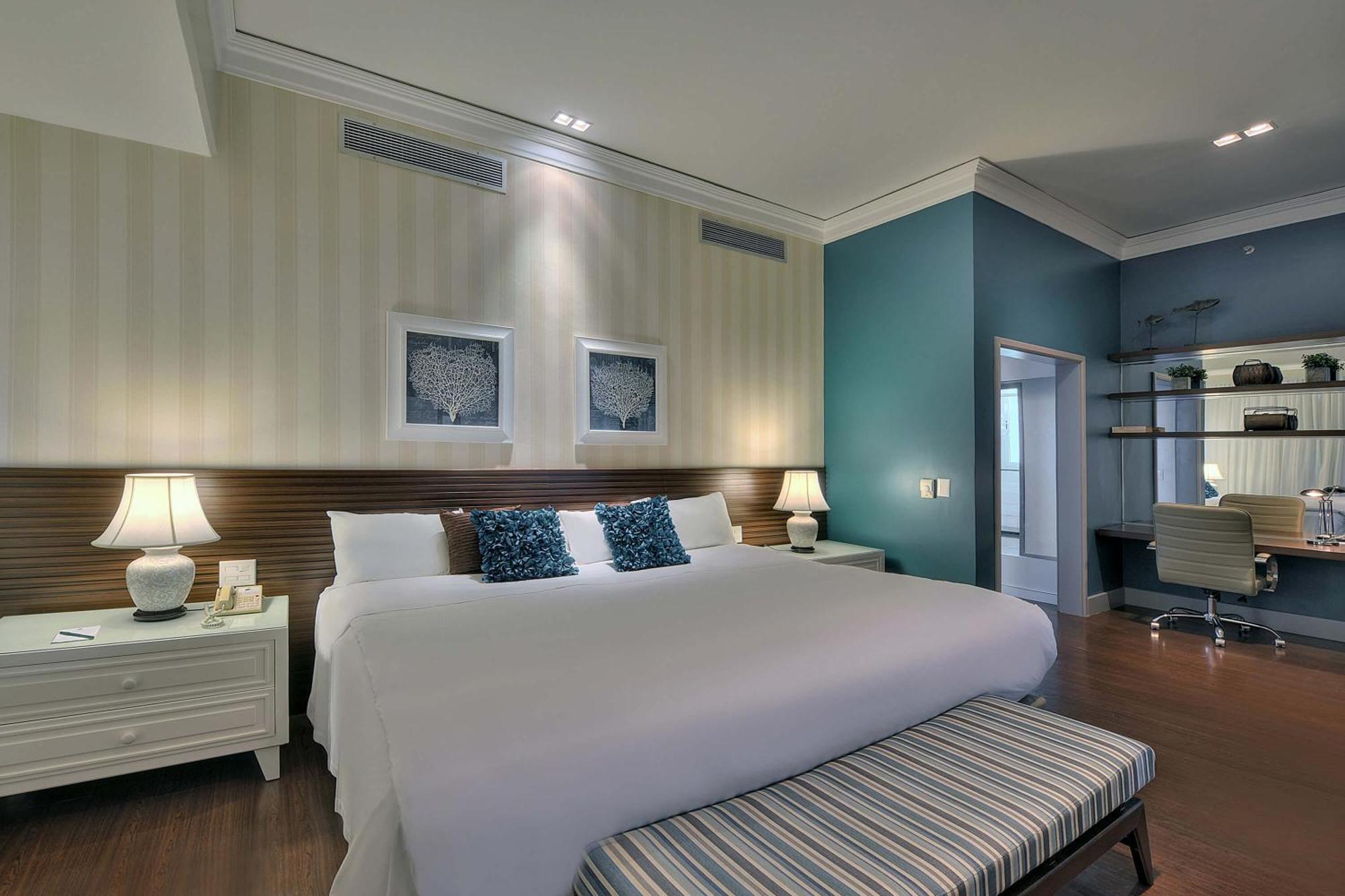 Hotel Deville Prime Salvador Luaran gambar A bedroom at the hotel